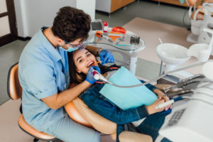 dentist checking the teeth